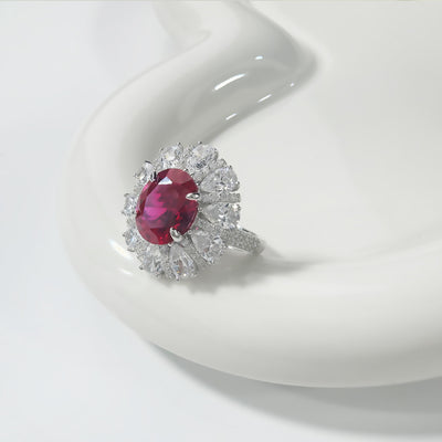 AuraBelle 925 red zircon ring oval main stone, rhodium-plated ring setting is smooth, delicate and comfortable